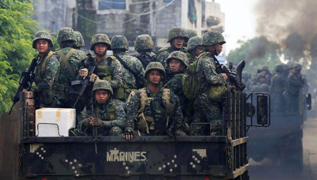 US spy planes help Philippine troops quell siege US spy planes help Philippine troops quell siege