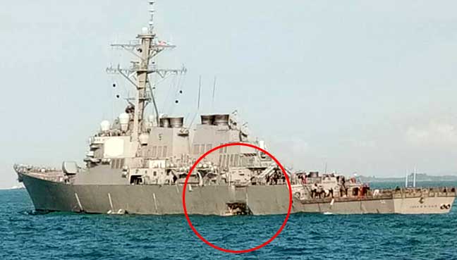 US Navy ship collides with merchant ship east of Singapore US Navy ship collides with merchant ship east of Singapore