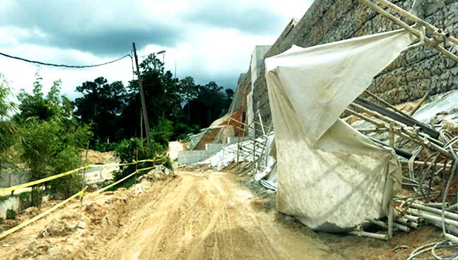 Road to the Maahad Tahfiz Darul Huffaz, near the construction site of the highway.