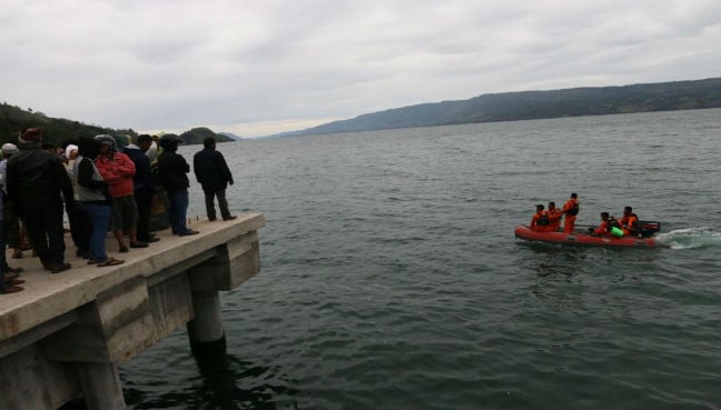 Indonesia lists 180 missing on doomed ferry, launches underwater search