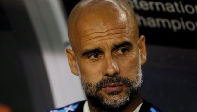Manchester City manager Pep Guardiola before the match against Borussia Dortmund