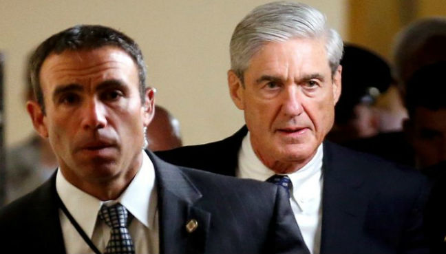 Special counsel Robert Mueller right departing after a briefing with senators on his investigation
