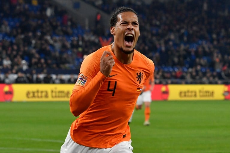 Netherlands’ defender Virgil van Dijk celebrates during the UEFA Nations League match against Germany in Gelsenkirchen