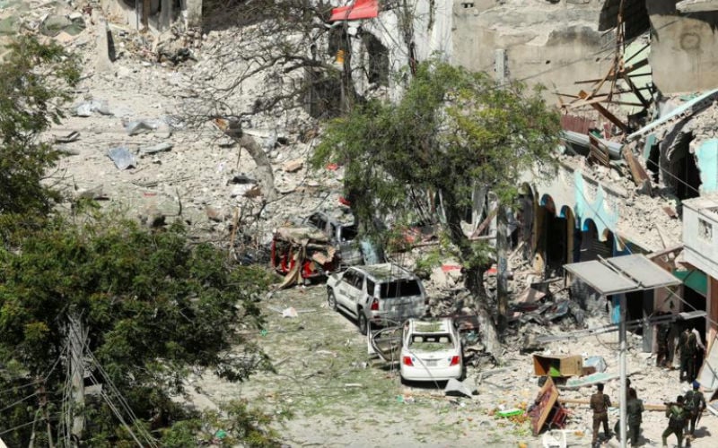 Death toll in Somalia bombing, clashes rises to 18
