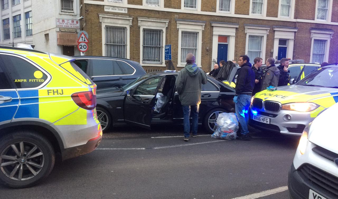 Police were forced to open fire on a vehicle after it rammed the parked car of Ukraine’s ambassador in London