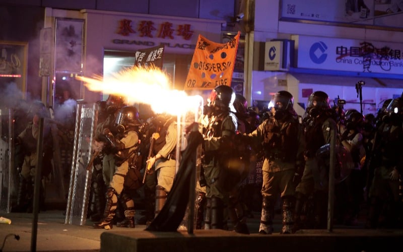 Hong Kong riot police gather ahead of harbour-front protest