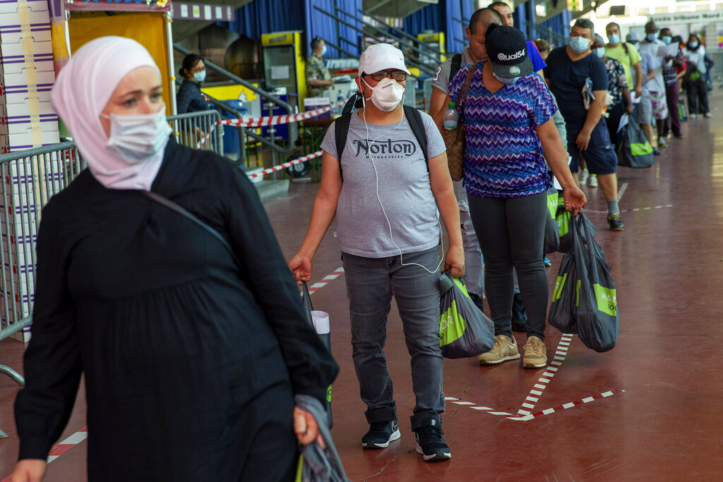 Thousands queue for food as virus lays bare poverty in rich Geneva ...