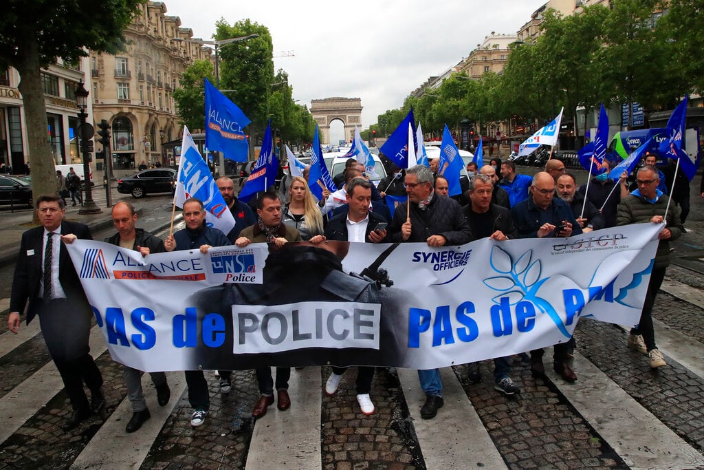 Police protest in major French cities against ban on chokeholds