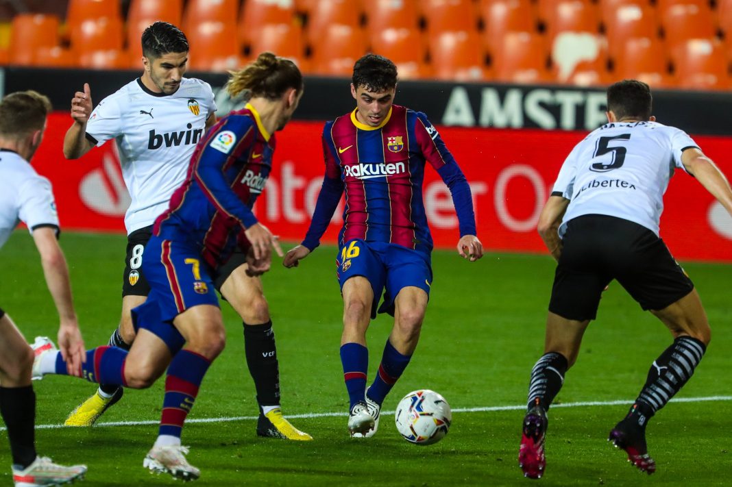 Messi brace helps Barca to nail-biting win over Valencia ...